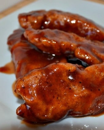 Honey BBQ Chicken Tenders: Juicy Chicken Breast Tenders Drenched in a Sweet and Sassy Homemade Sauce