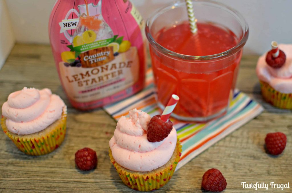 Raspberry Cupcakes with Berry Lemonade Frosting: Moist, sweet cupcakes topped with tangy berry lemonade frosting. It's like taking a big swig of lemonade with every bite. #PourMoreFun #ad #CollectiveBias