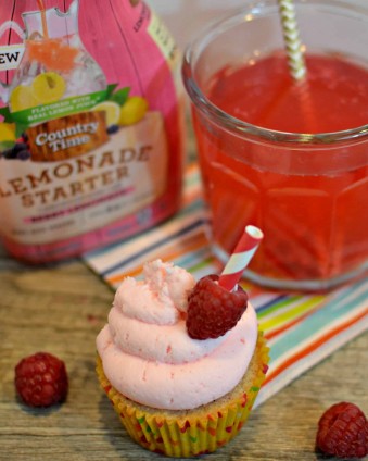 Raspberry Cupcakes with Berry Lemonade Frosting: Moist, sweet cupcakes topped with tangy berry lemonade frosting. It's like taking a big swig of lemonade with every bite. #PourMoreFun #ad #CollectiveBias