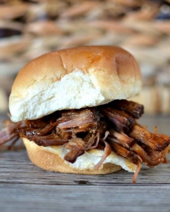 Easy Crockpot Shredded Beef Sliders: This 4 ingredient dinner takes less than 2 minutes to throw together and will have everyone asking for seconds.