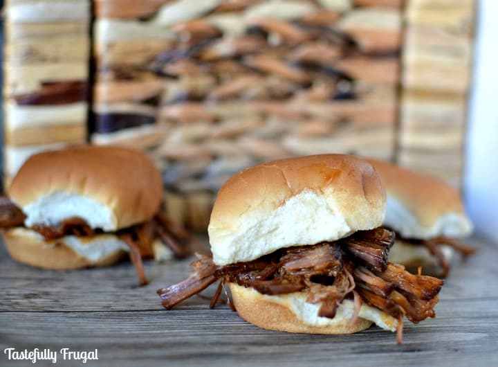 Easy Crockpot Shredded Beef Sliders: This 4 ingredient dinner takes less than 2 minutes to throw together and will have everyone asking for seconds.