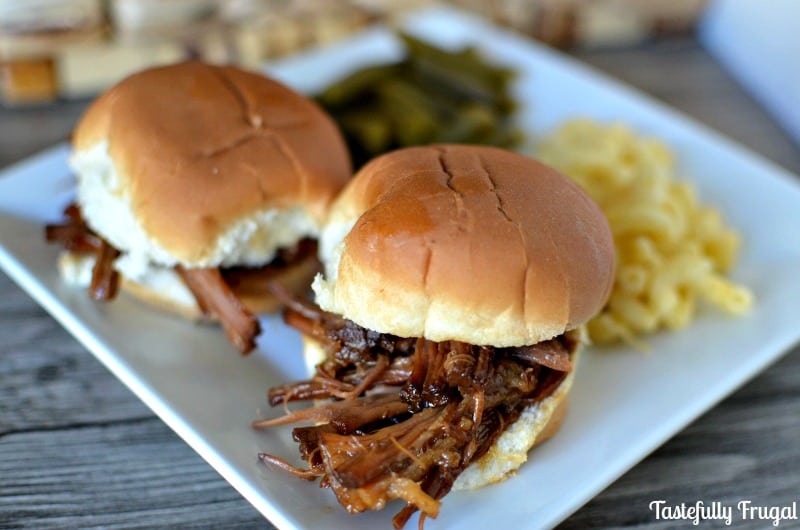 Easy Crockpot Shredded Beef Sliders: This 4 ingredient dinner takes less than 2 minutes to throw together and will have everyone asking for seconds.