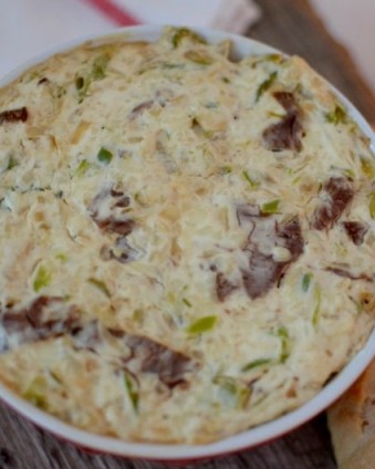 Wow your guests with this easy 25 minute Philly Cheese Steak Dip | Tastefully Frugal