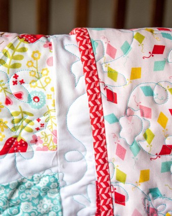 Step By Step Tutorial on how to make a baby quilt cutting the fabric out with your Cricut Maker. #CricutMade #MyCricutQuilt #RileyBlakeDesigns #ad